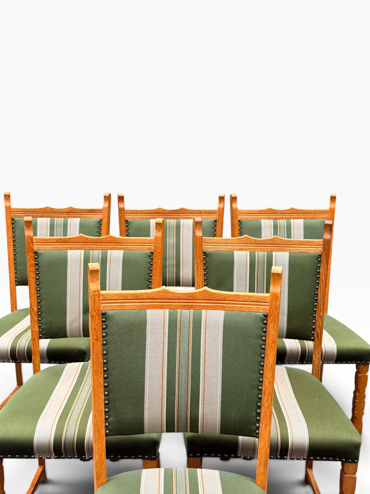 Close grouped view of oak chair backs