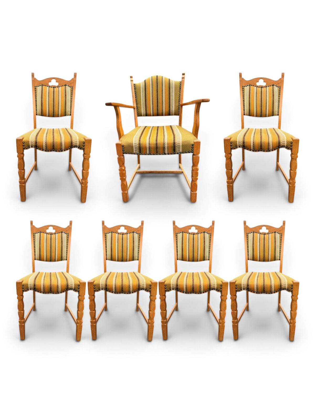 Set of seven Henning Kjærnulf oak dining chairs, captain's chair and six side chairs