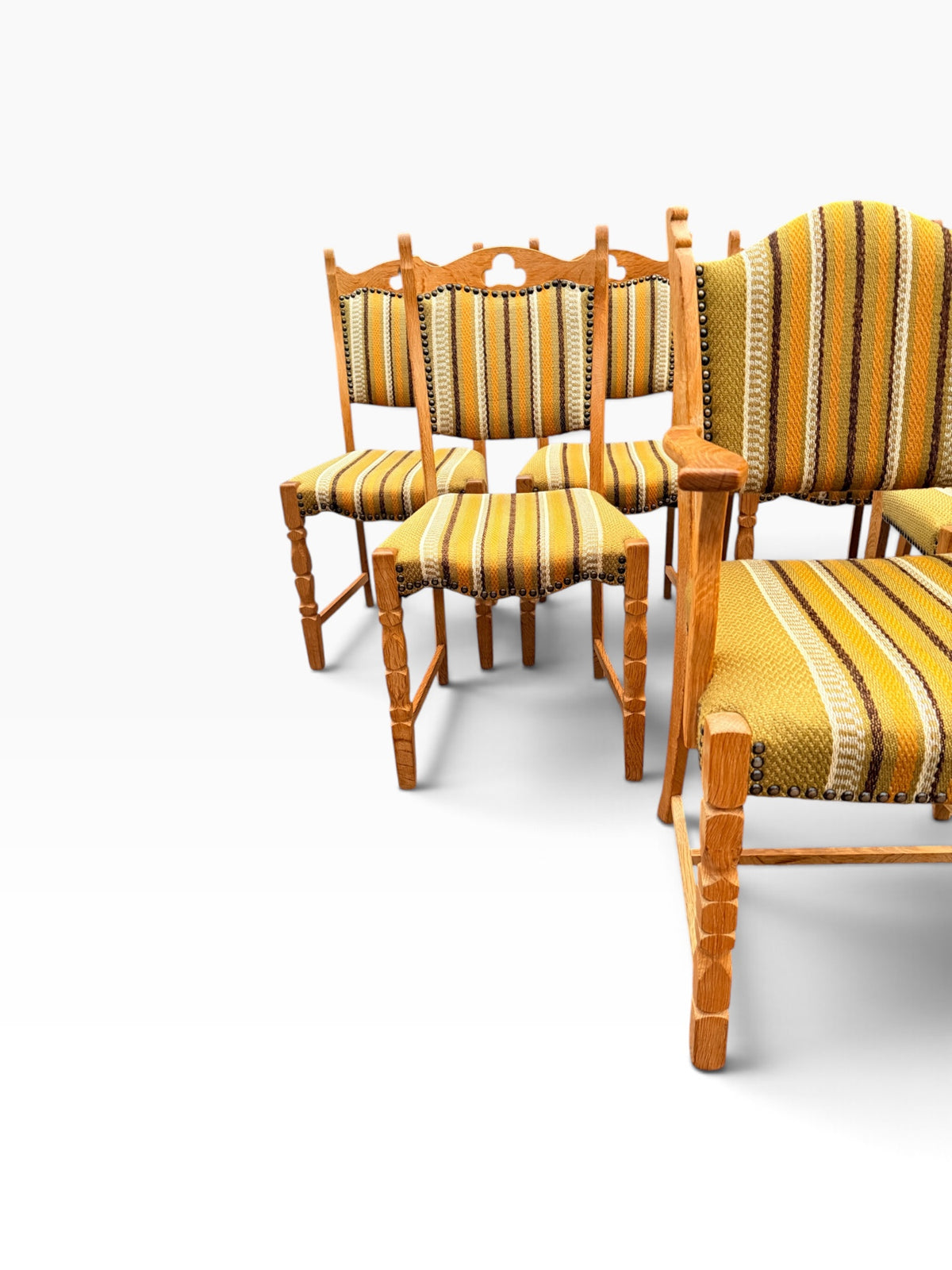 Captain's chair in front of side chairs, close group view