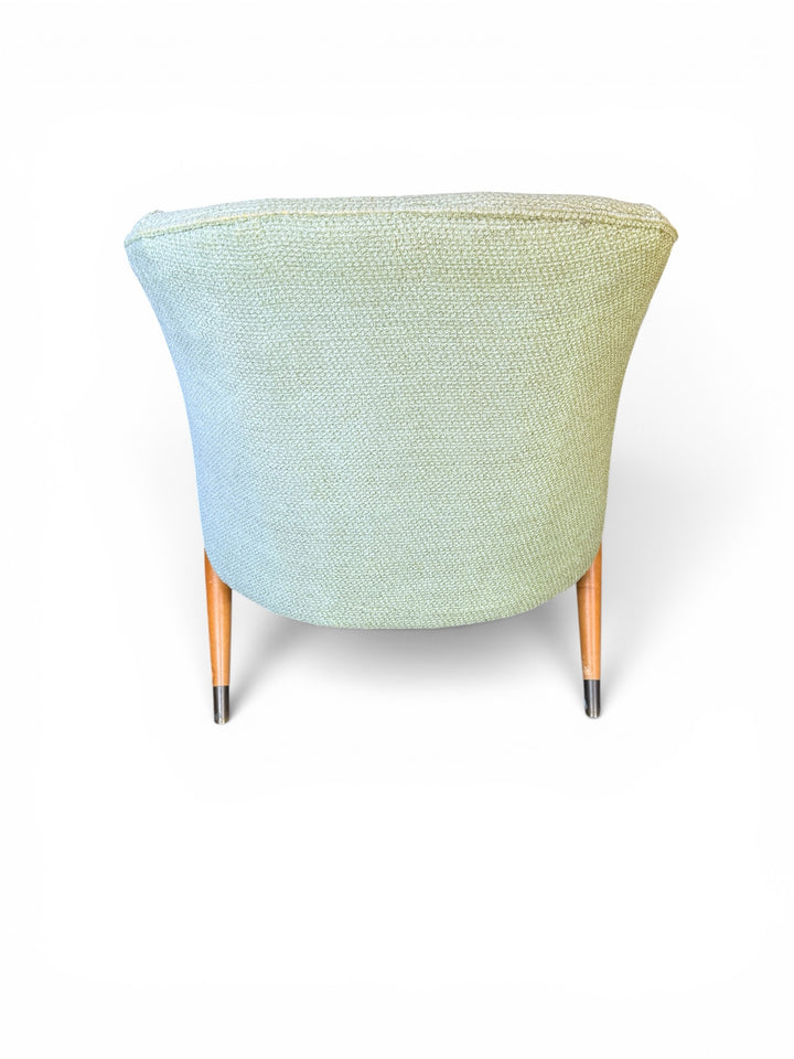 Italian lounge chair — front three-quarter view showing seat cushion and arm detail