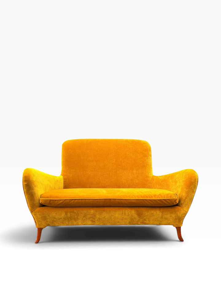 Italian mid-century sculptural wing arm loveseat in saffron gold velvet, front view
