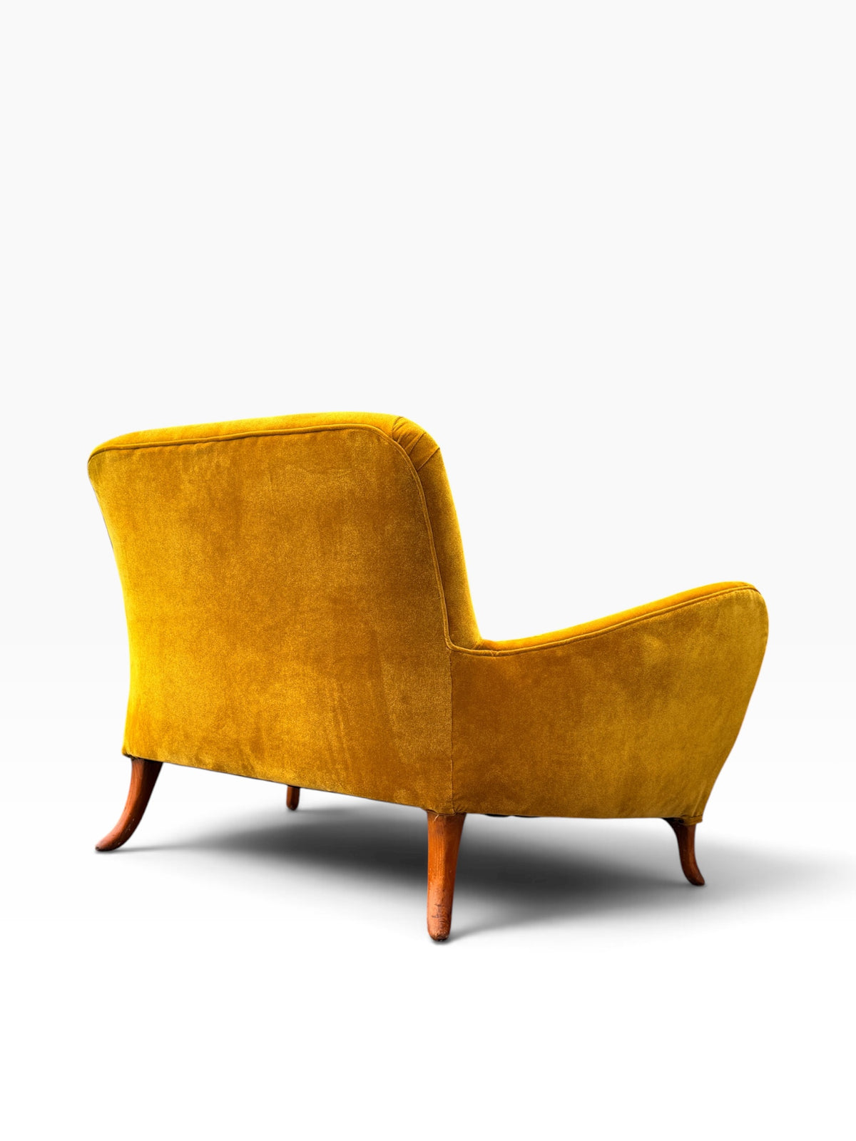 Back three-quarter view showing finished rear upholstery