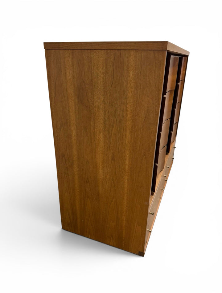 Johnson Carper dresser — side view showing walnut veneer and tapered legs