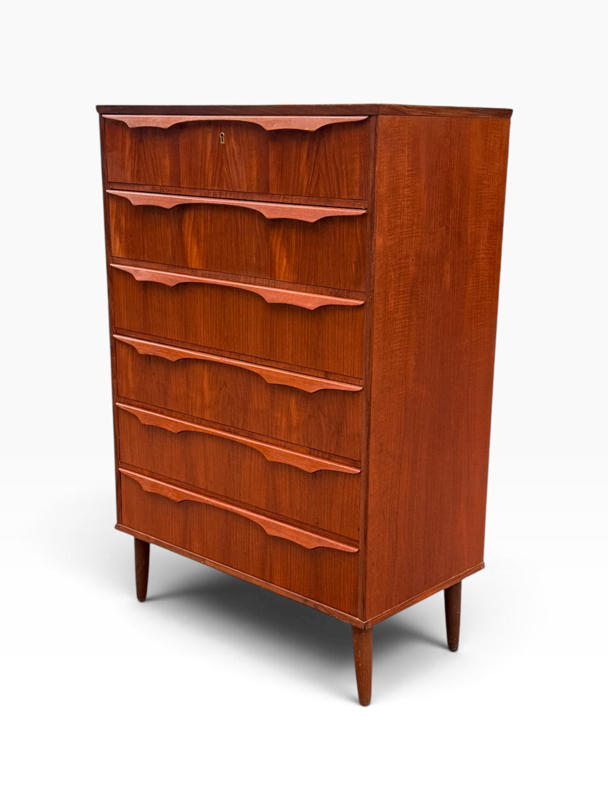 Teak chest of drawers, angled front view