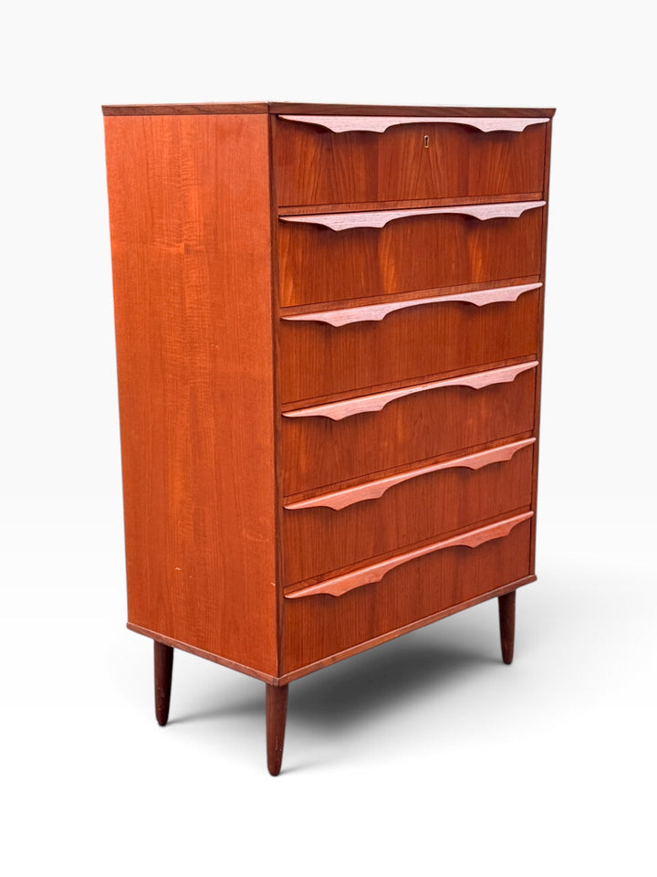 Teak chest of drawers, opposite angled view