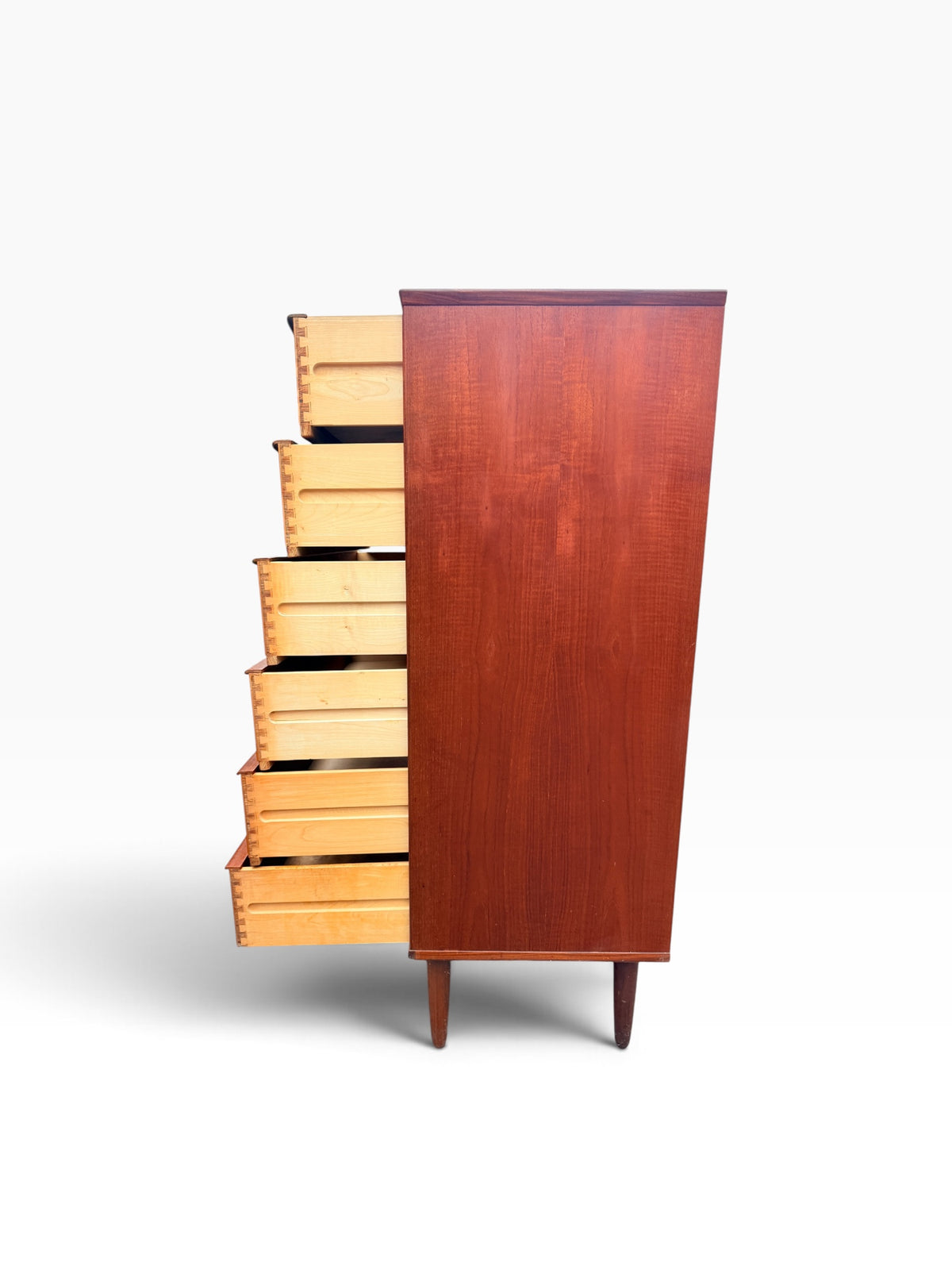 Teak chest with drawers open, side view