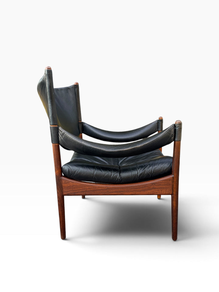 Rosewood Modus lounge chair, angled side view