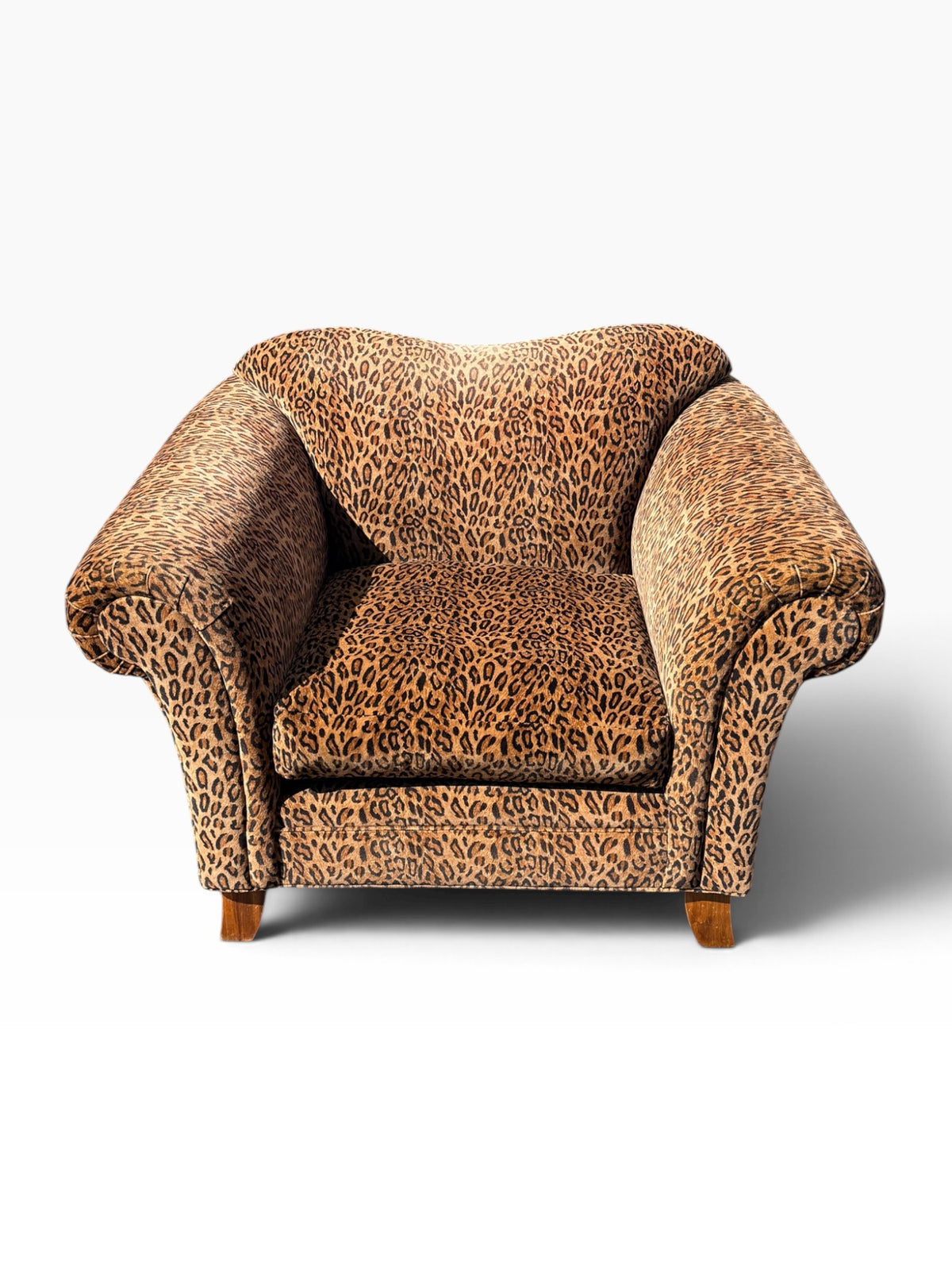 Leopard print club chair front view with pillow removed