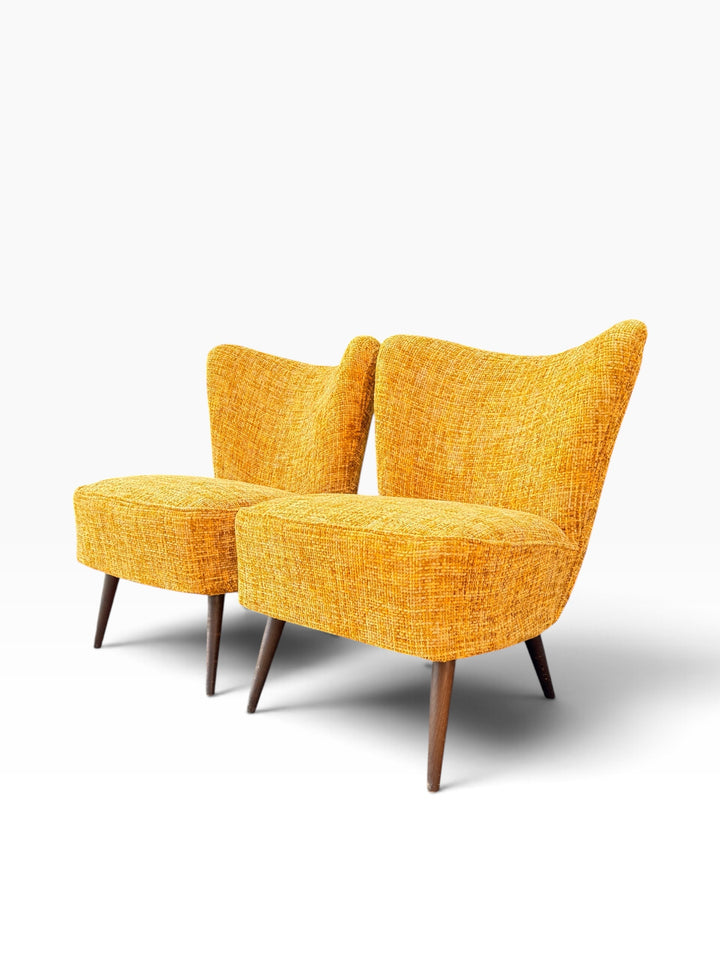 Pair of mid-century cocktail chairs, angled view