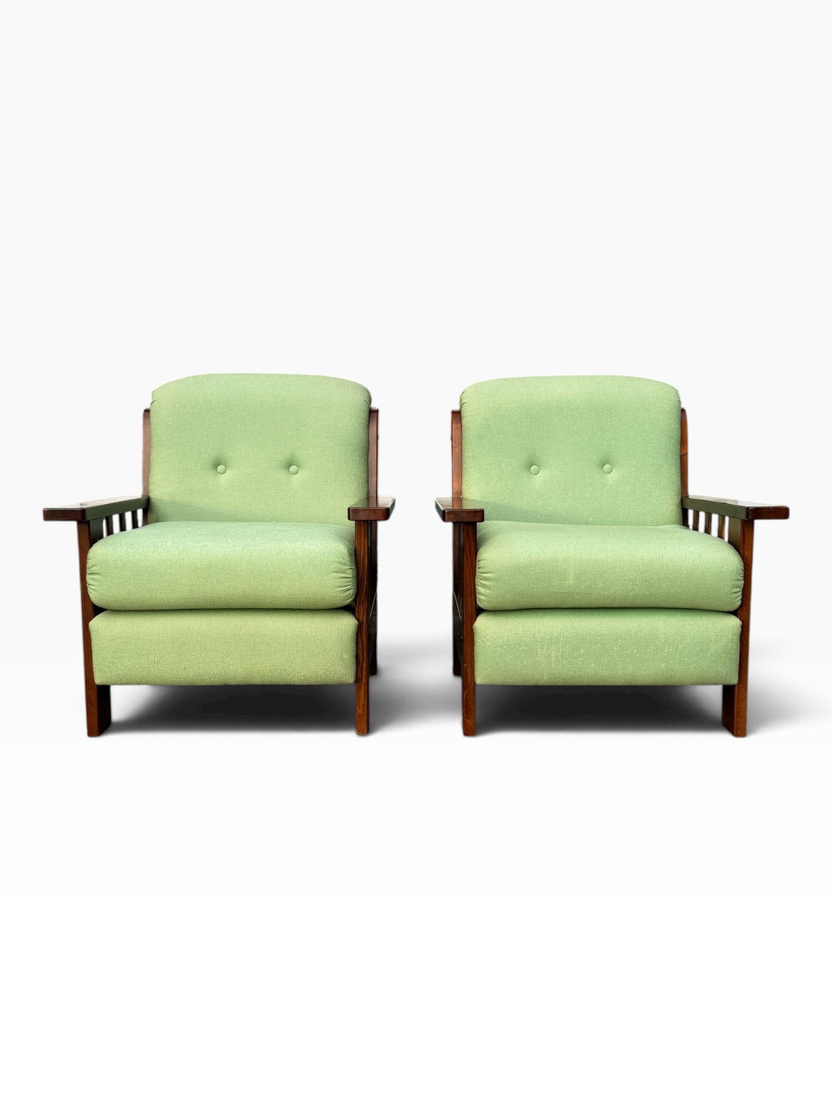Pair of Mission oak lounge chairs with mint green upholstery, front view