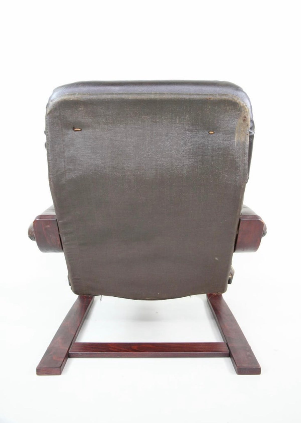 Rear view showing the canvas back panel and cantilever frame