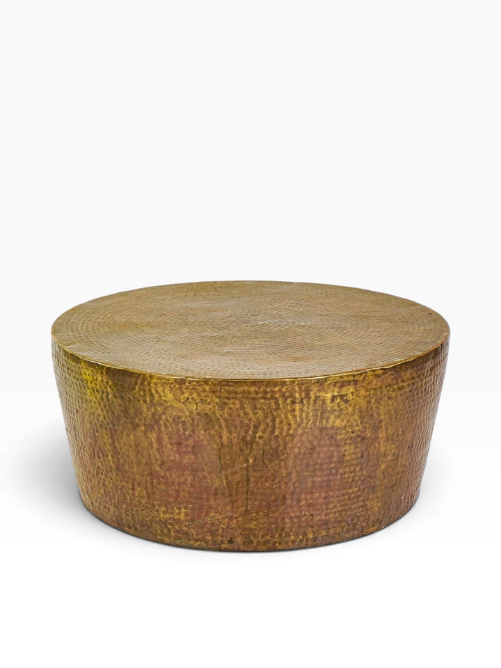 Studio A Izmir hammered brass coffee table, round drum form in antique brass, front view