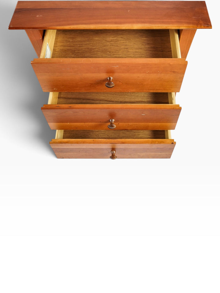 Thor's Elegance cherry nightstand with all three drawers open