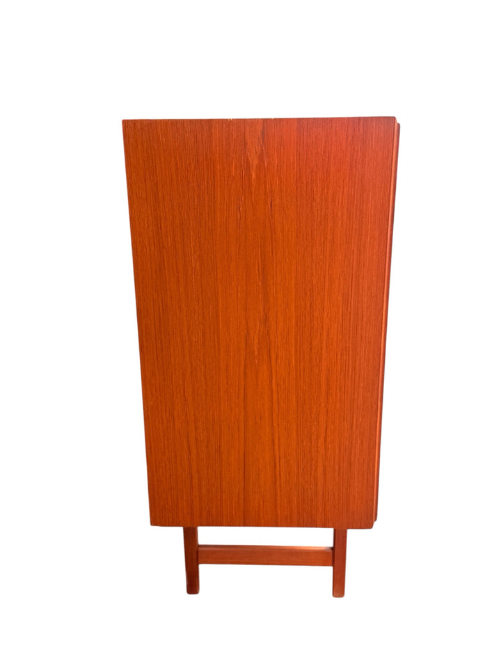 E.W. Bach teak highboard — top surface detail showing minor stain