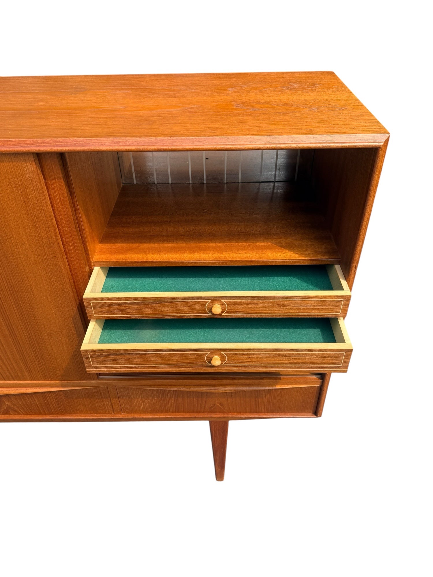 E.W. Bach teak highboard — three bottom drawers open